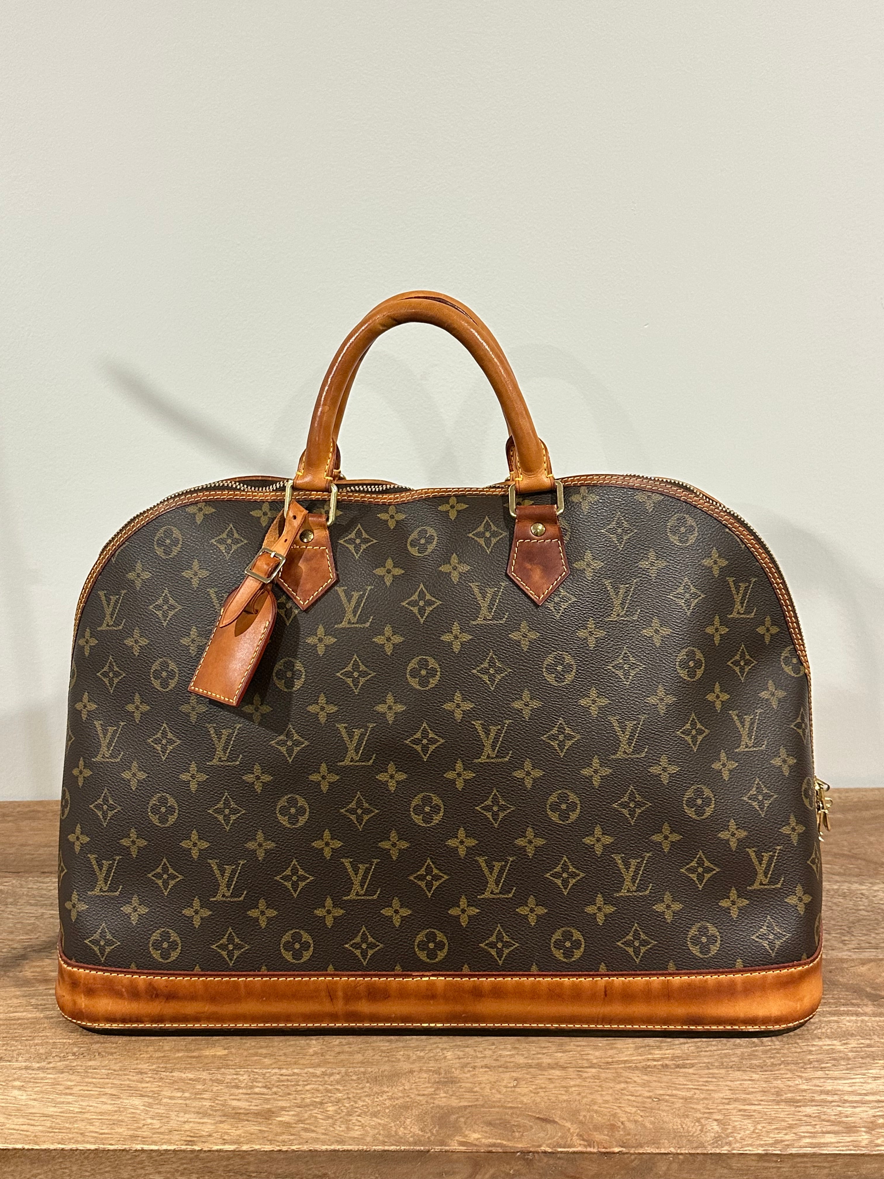 Authenticated | Vintage Louis Vuitton | Monogram Alma Voyage GM